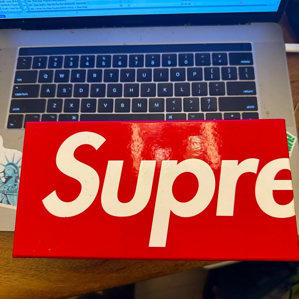 Supreme spray paint cans